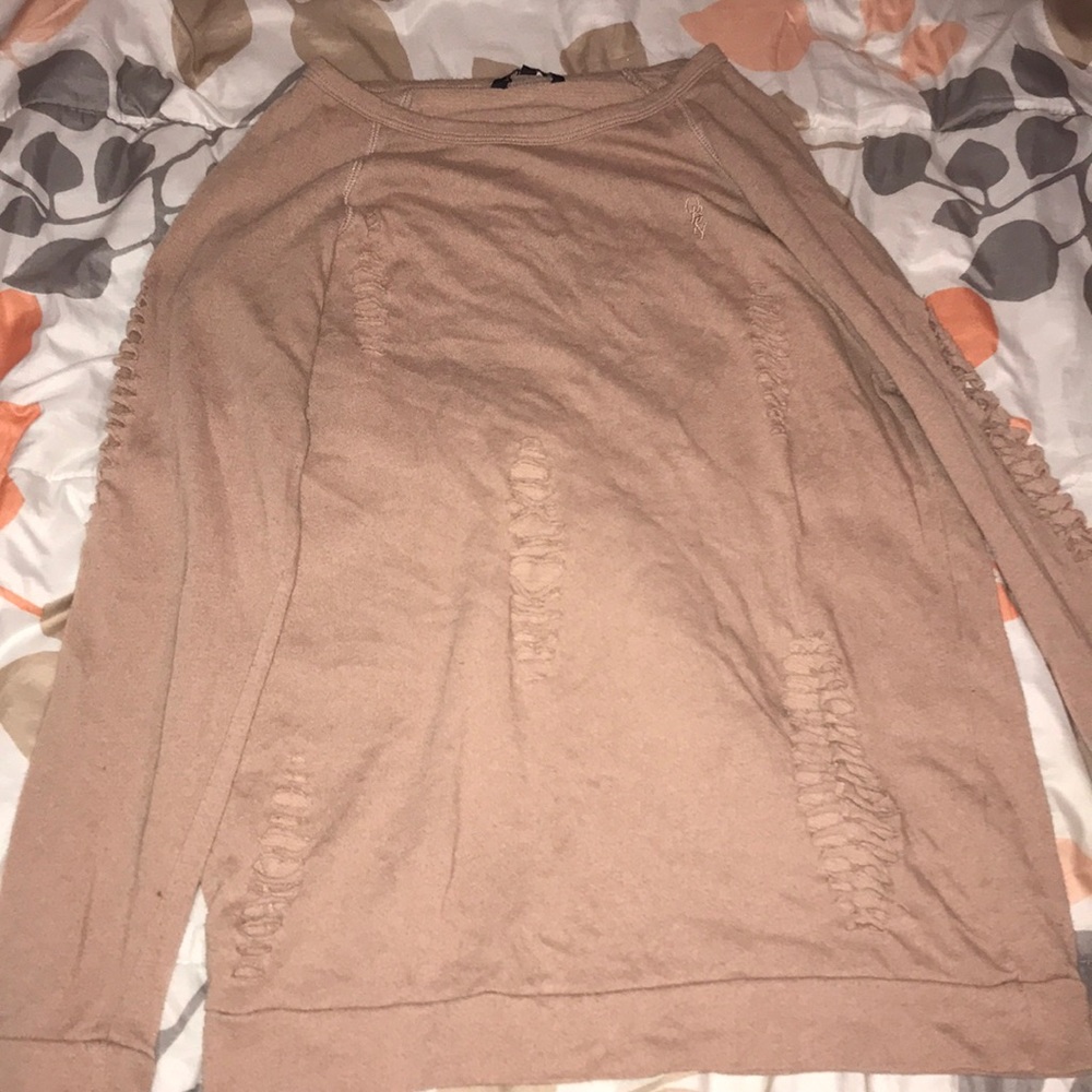Stylish ripped sweater